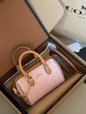 COACH Classic Pink Flower Cylinder Bag